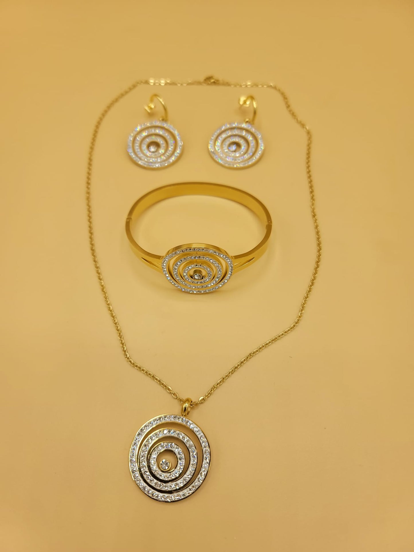 Set aros dorados con cristales